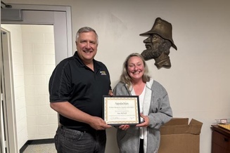 Amy McNeill with Award